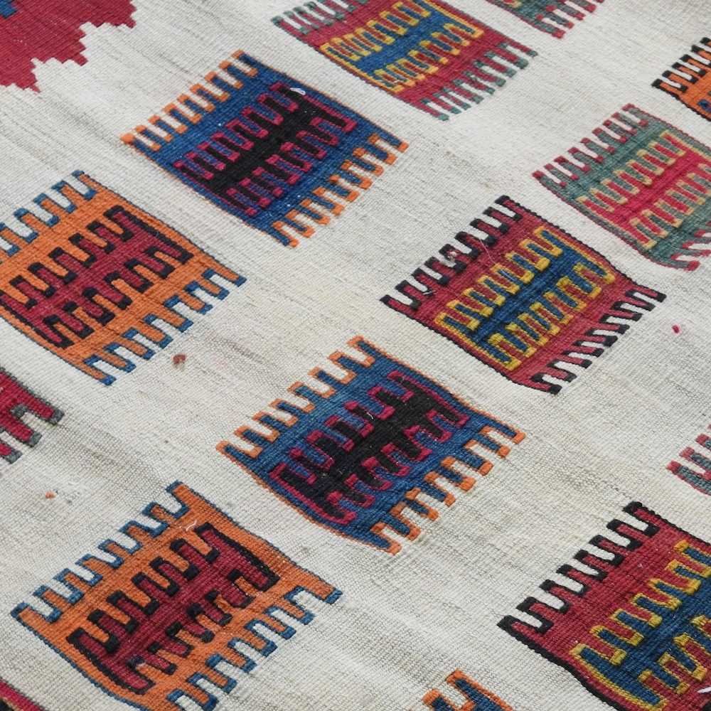 A Persian qashqai kilim, with coloured squares, within a zig zag border, 220 x 125cm - Image 4 of 5
