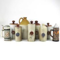A collection of stoneware hot water bottles and flagons