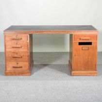 A mid century pedestal desk, with an inset writing surface 153w x 76d x 76h cm