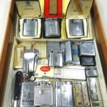A collection of vintage pocket lighters, to include Ronson and a gilt propelling toothpick, with