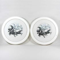 A pair of modern plaques, each decorated in relief with pottery horses, 44cm diameter (2)