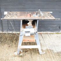 An electric workshop table saw, 131cm wide