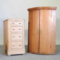 A 19th century pine bow front hanging corner cabinet, 69cm wide, together with a Victorian pine