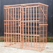 A French iron wine rack, with hinged doors 103w x 56d x 13h cm