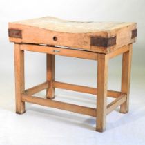 A beech and pine butcher's block, on stand 92w x 61d x 83h cm