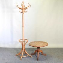 A beech bentwood hat stand, together with a pine occasional table, on a tripod base, 64cm wide (2)