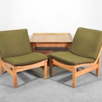 A pair of 1970's lounge chairs, together with a table (3)