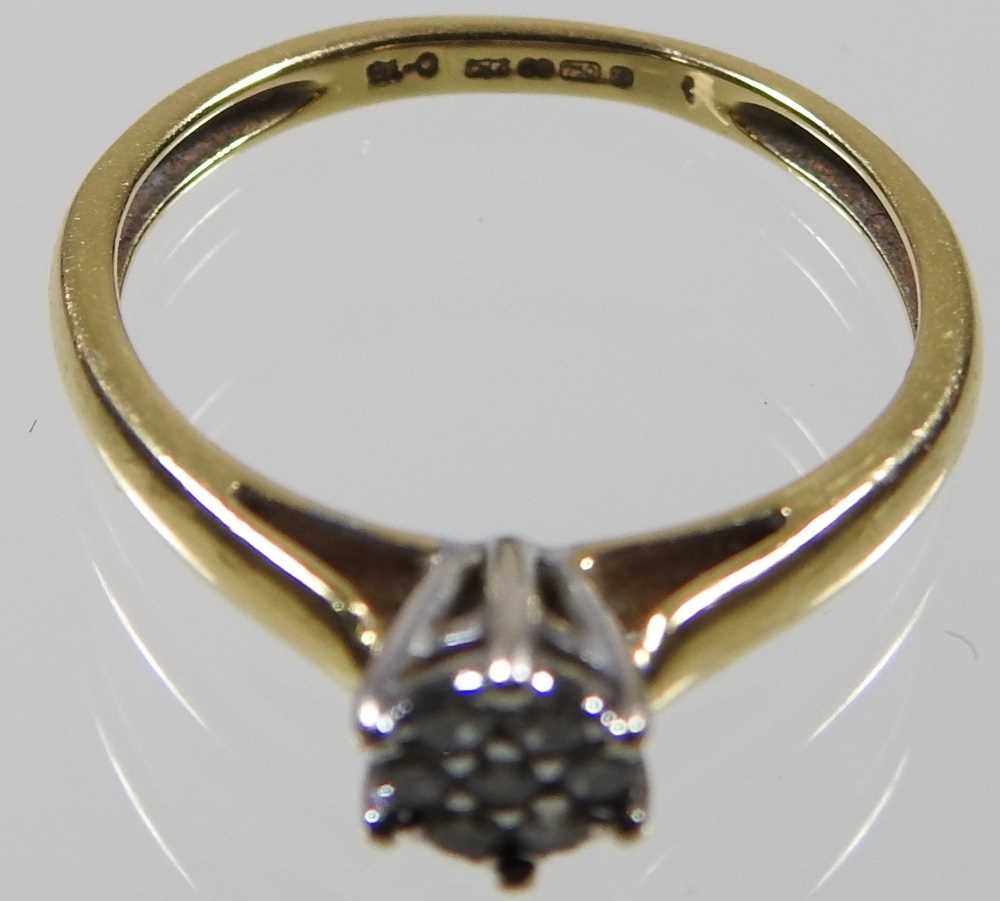 An 18 carat gold diamond set cluster ring, set with seven stones, 2.9g, size N - Image 2 of 4