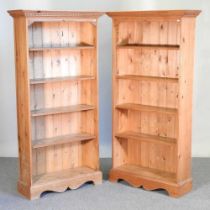 A pair of pine standing open bookcases, each with a dentil moulded cornice (2) 97w x 35d x 189h cm