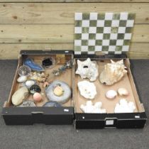 A hardstone chess board, together with a collection of hardstone eggs, shells and rock samples