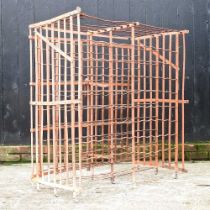 A French iron wine rack, with hinged doors 102w x 55d x 112h cm