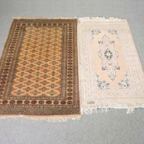 A bokhara rug, together with another (2) 188w x 126d cm