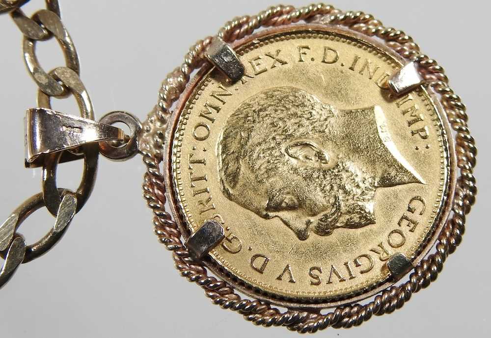 A 9 carat gold pendant, with a George V half sovereign dated 1926, suspended on a 9 carat gold - Image 2 of 4
