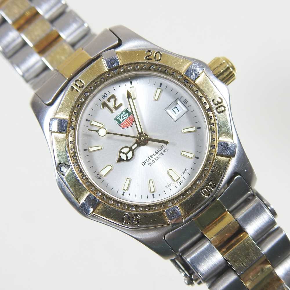 A Tag Heuer Professional ladies wristwatch, with a signed 20mm dial and bi-colour bracelet strap, no