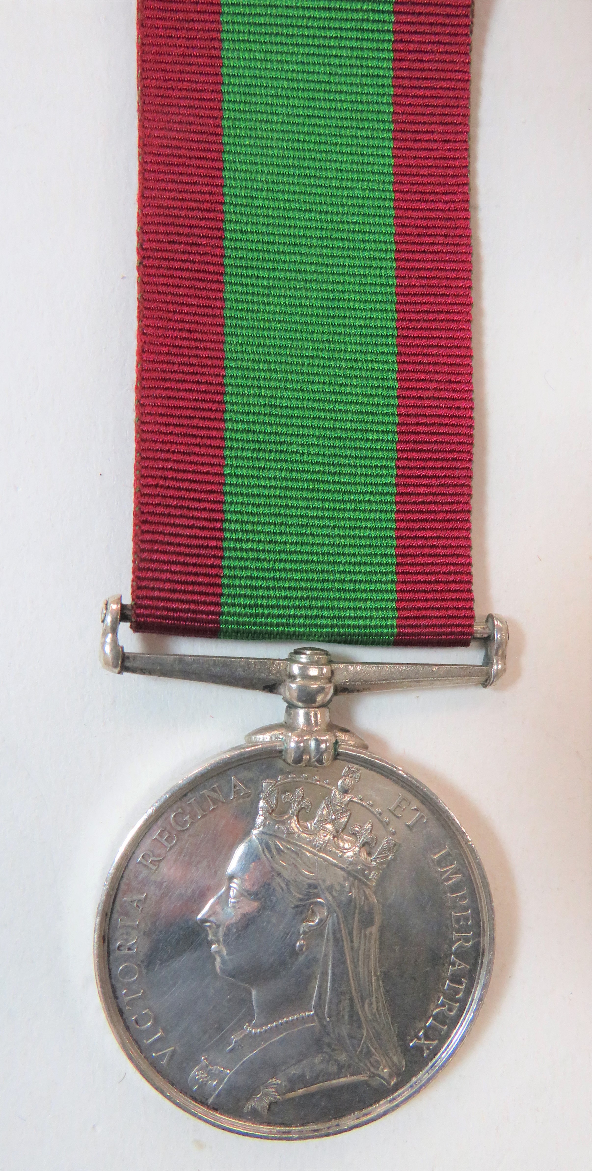 Victorian Afghanistan Medal 1878-80 example.  Named to "Cond. F Smith DO.CDT".  Minor edge knocks.