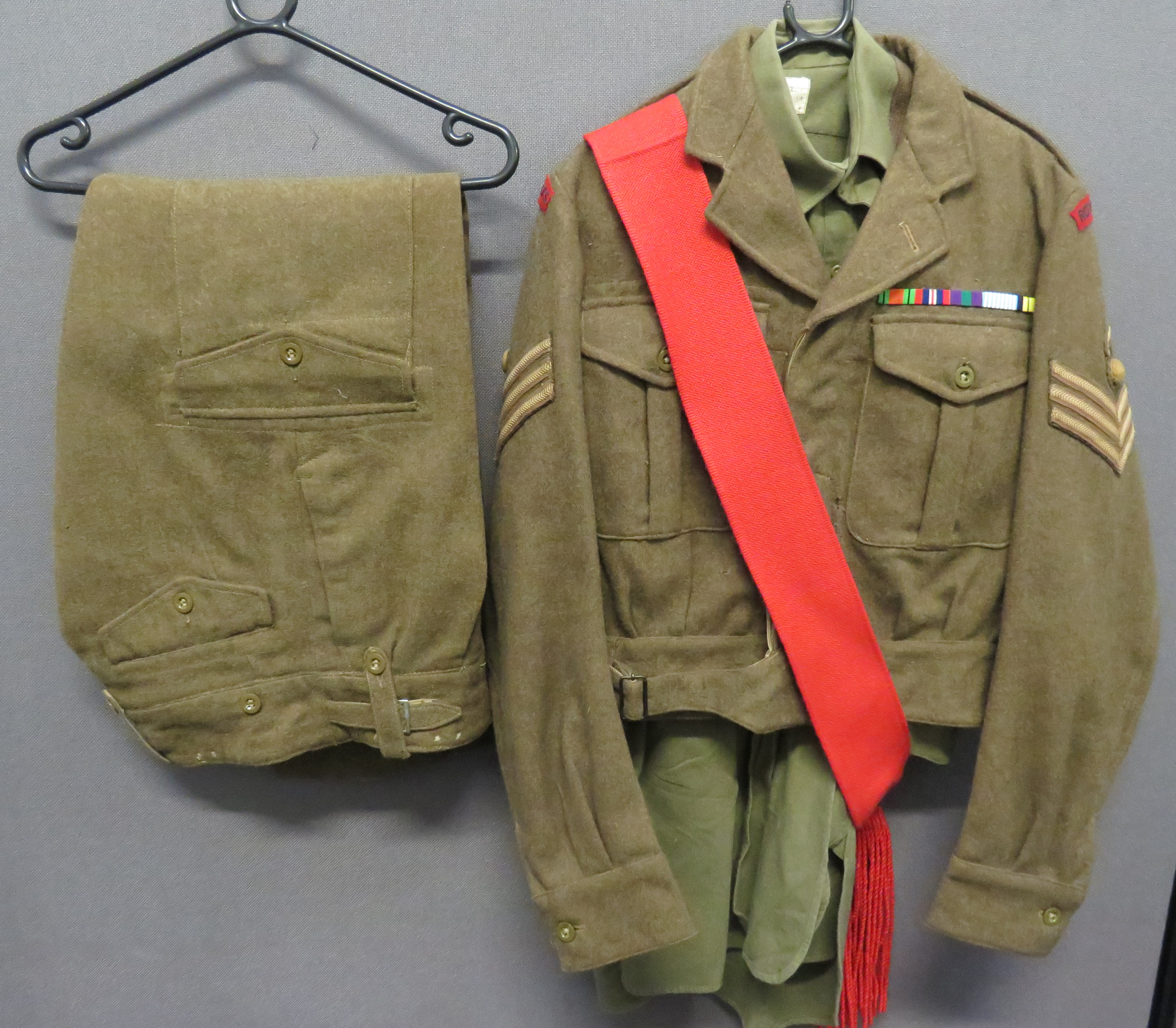 1949 Pattern Battledress Uniform consisting khaki woollen, single breasted, open collar, short