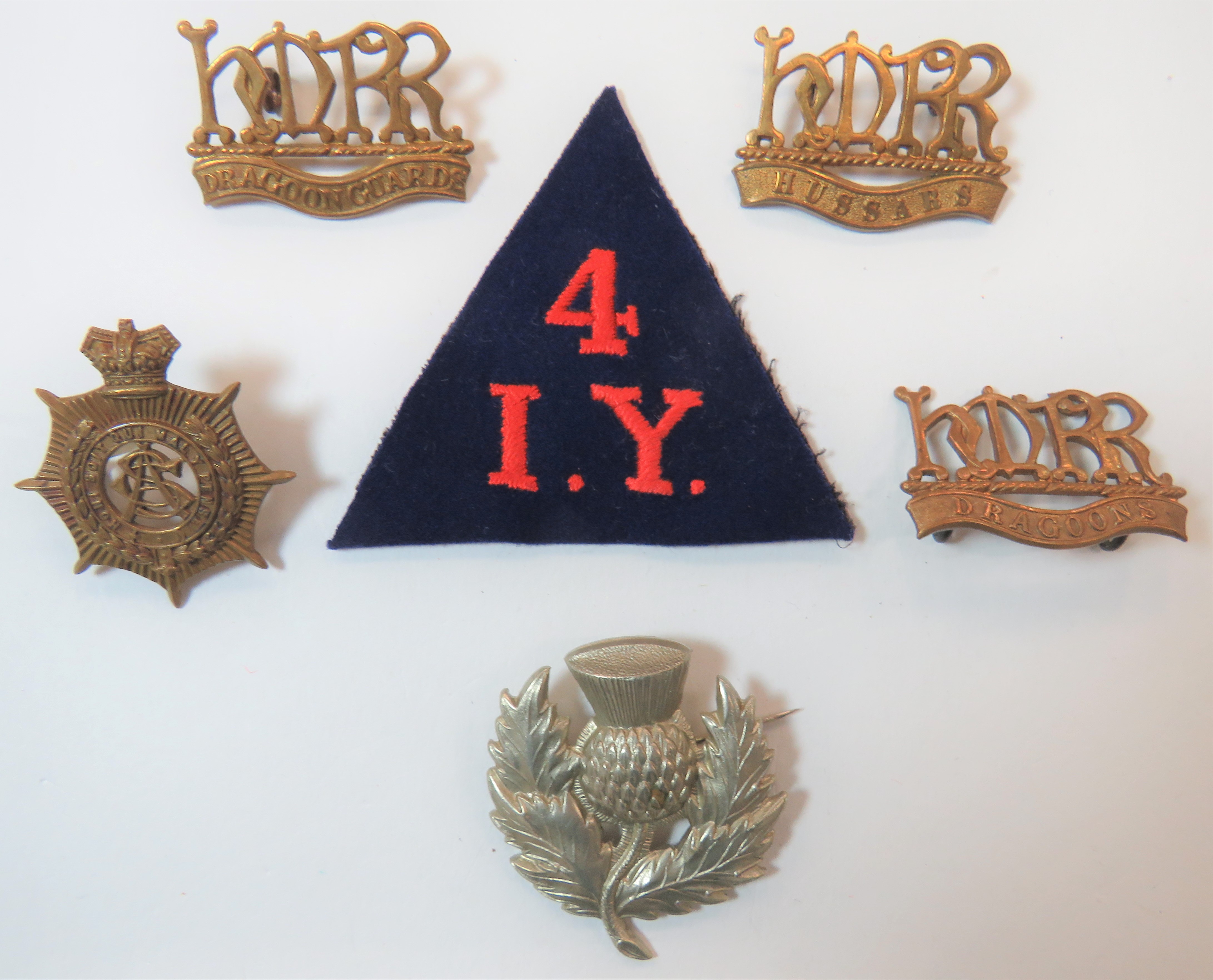 Victorian/Boer War Badges consisting white metal thistle.  Royal Scottish Reg.  Brooch fitting ...