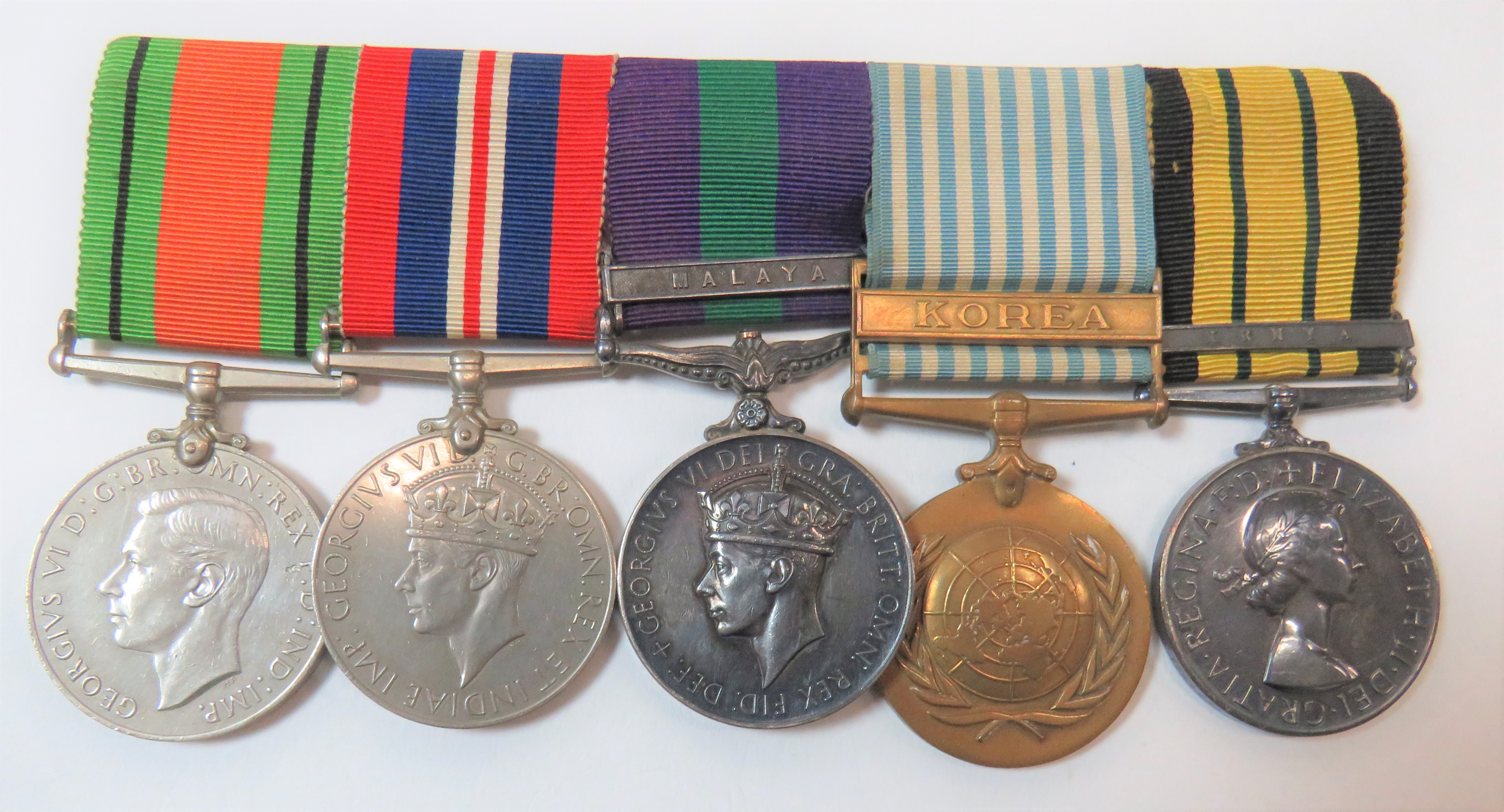 Post War Royal Armoured Corps/REME Medal Group consisting WW2 Defence medal, War medal, General