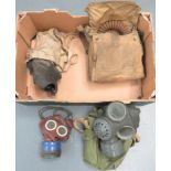 Small Selection of British Respirators consisting 1939 dated, hose mask complete in transit