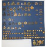 Indian Army Insignia. Good scarce interesting selection mounted on large card. Includes head-dress