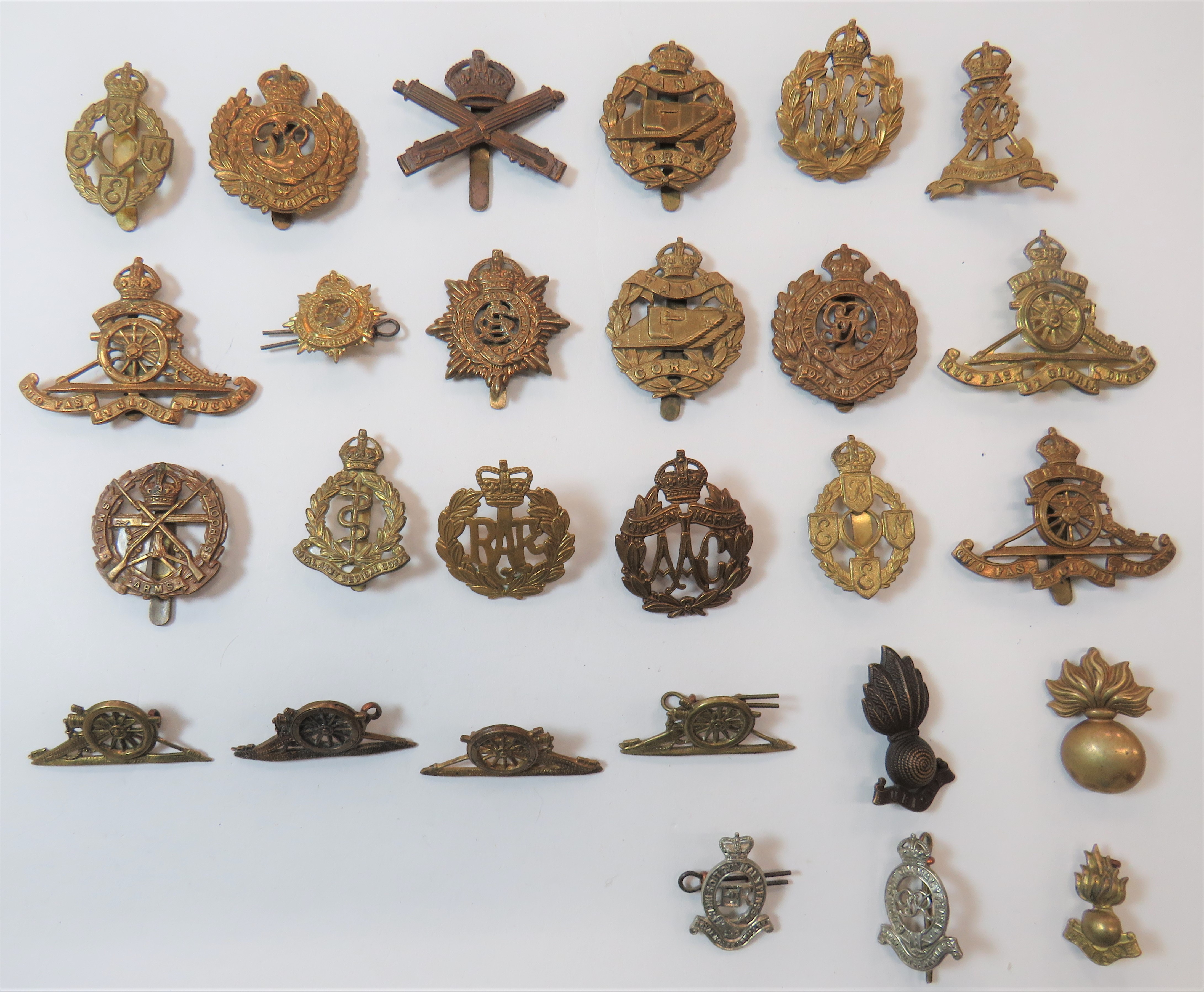 Corps Cap Badges including brass KC Tank Corps ... Brass KC Queen Mary's AAC ... Brass KC MGC ...