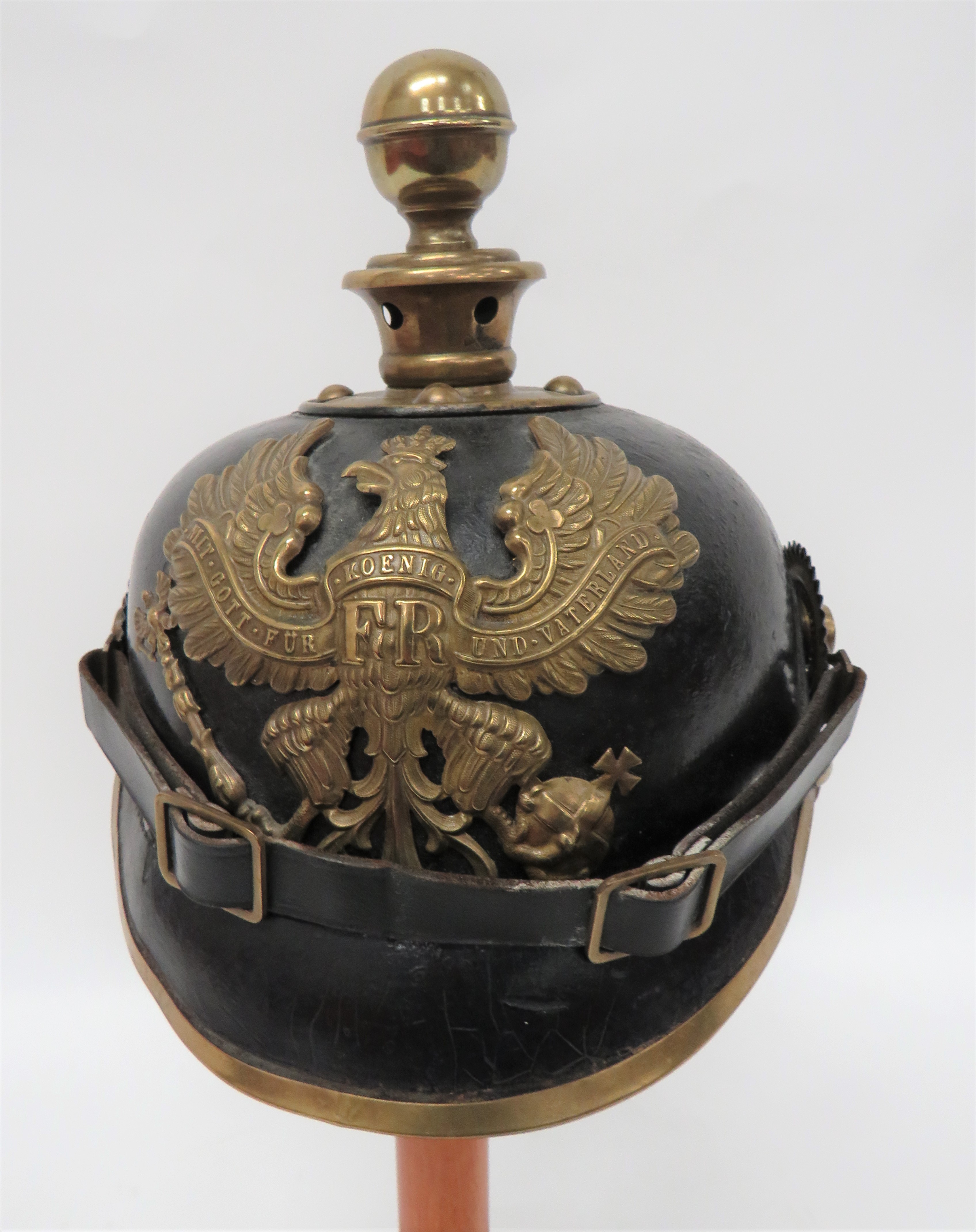 Imperial German Prussian Artillery Pickelhaube  black leather crown, attached peak with brass