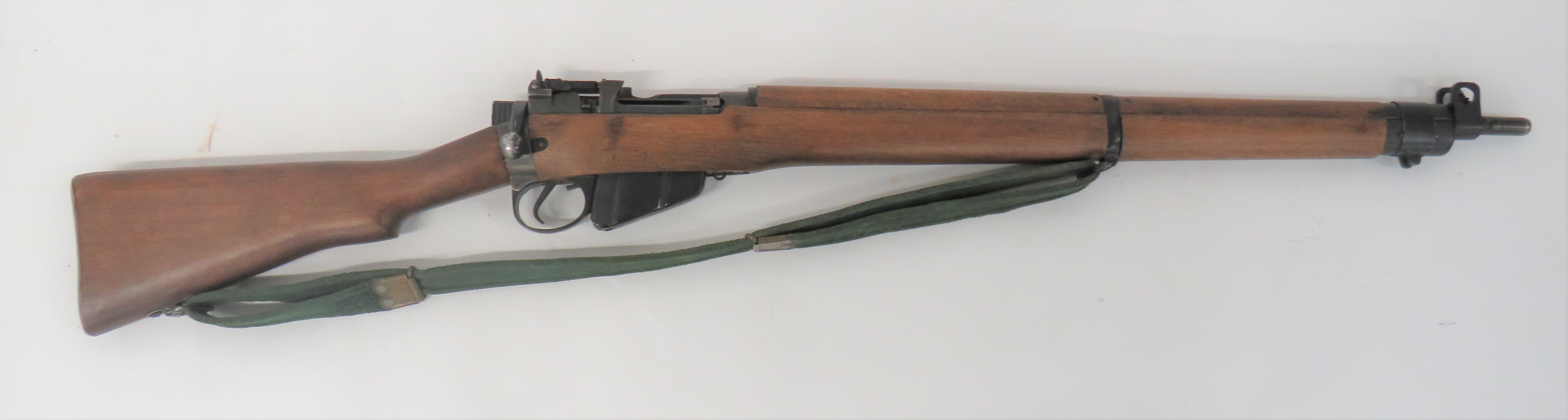 Deactivated Enfield No 4 Rifle .303, 25 inch barrel.  Front sight with protective ears.  Blackened