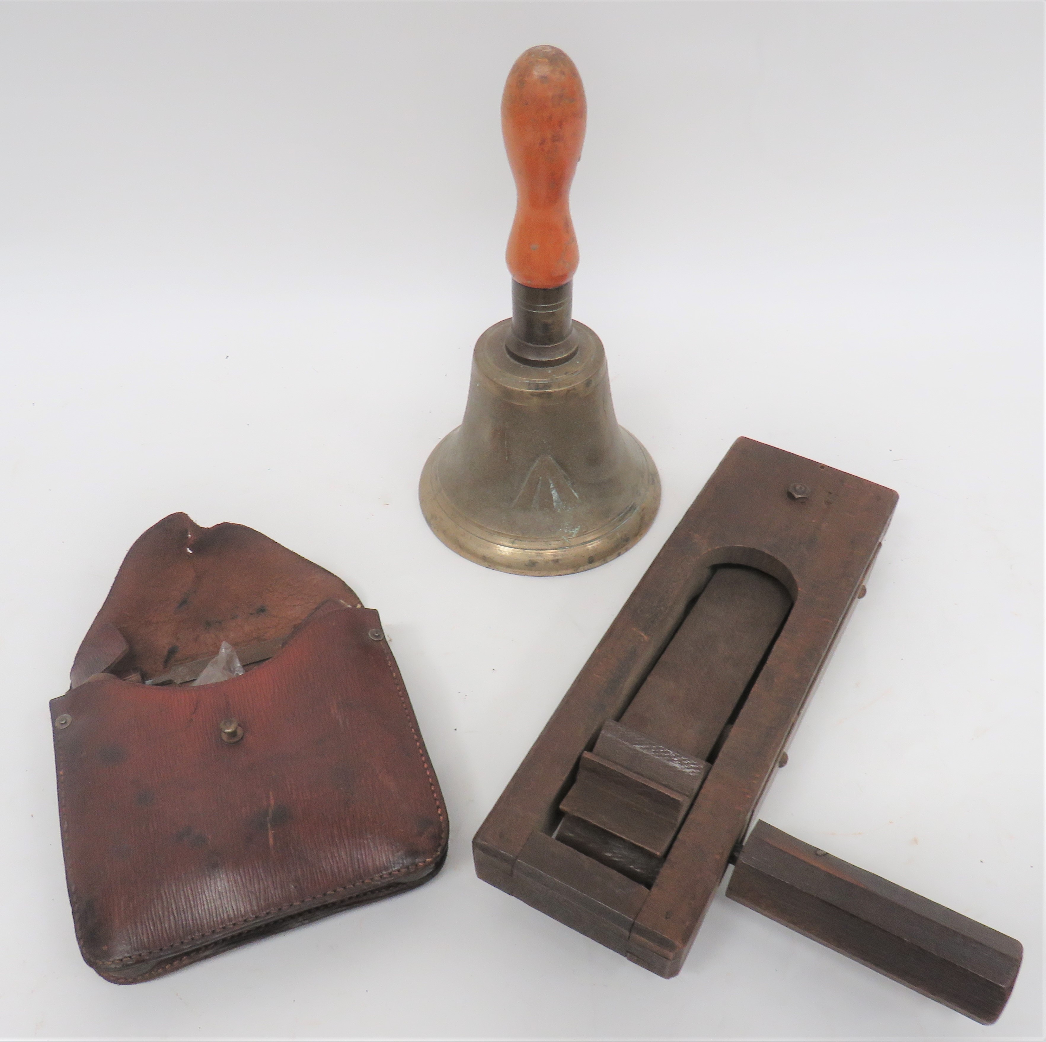 Small Selection of Equipment Including Home Front including a wooden hand rattle with steel