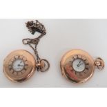Two Half Hunter Gilt Pocket Watches consisting gilt cased example with protective cover.  White face