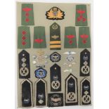 26 Items Of Insignia For Zambian Police display board with good tabulated display of metal and cloth