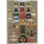 48 Items of Insignia For Sierra Leone & Gambia display board with good tabulated display of metal