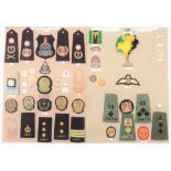 43 Items Of Insignia For Tanzania Military And Police two display boards with good tabulated display