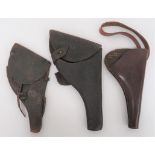 Three Various Revolver Holsters consisting early style, dark brown revolver holster.  The top flap