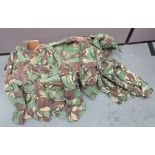 Six British Army Combat Smocks brown, tan, black and green camouflaged smocks with hoods.  Patch