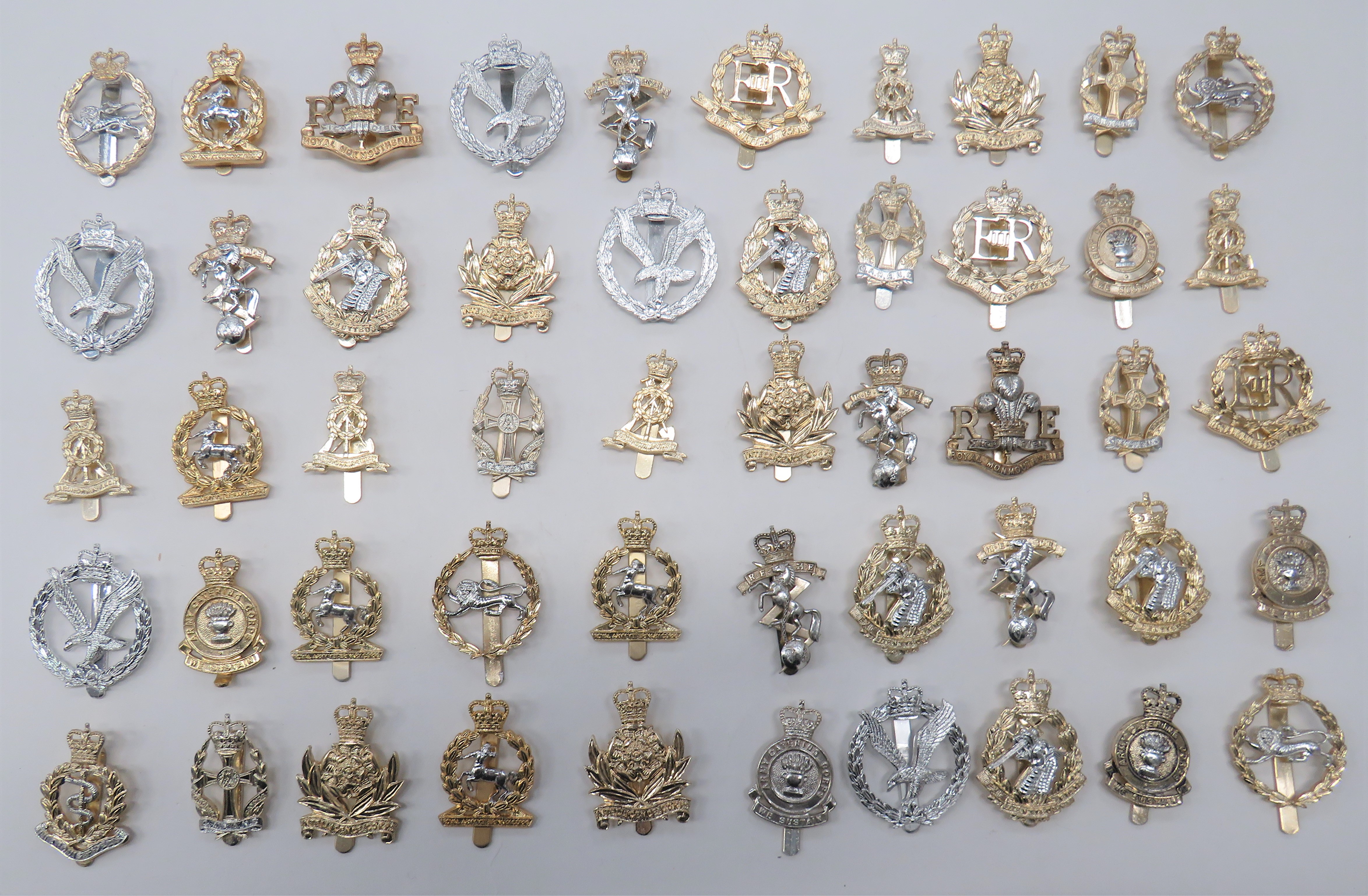 50 x Anodised Corps Cap Badges including QC Royal Monmouthshire RE ... QC Intelligence Corps ...