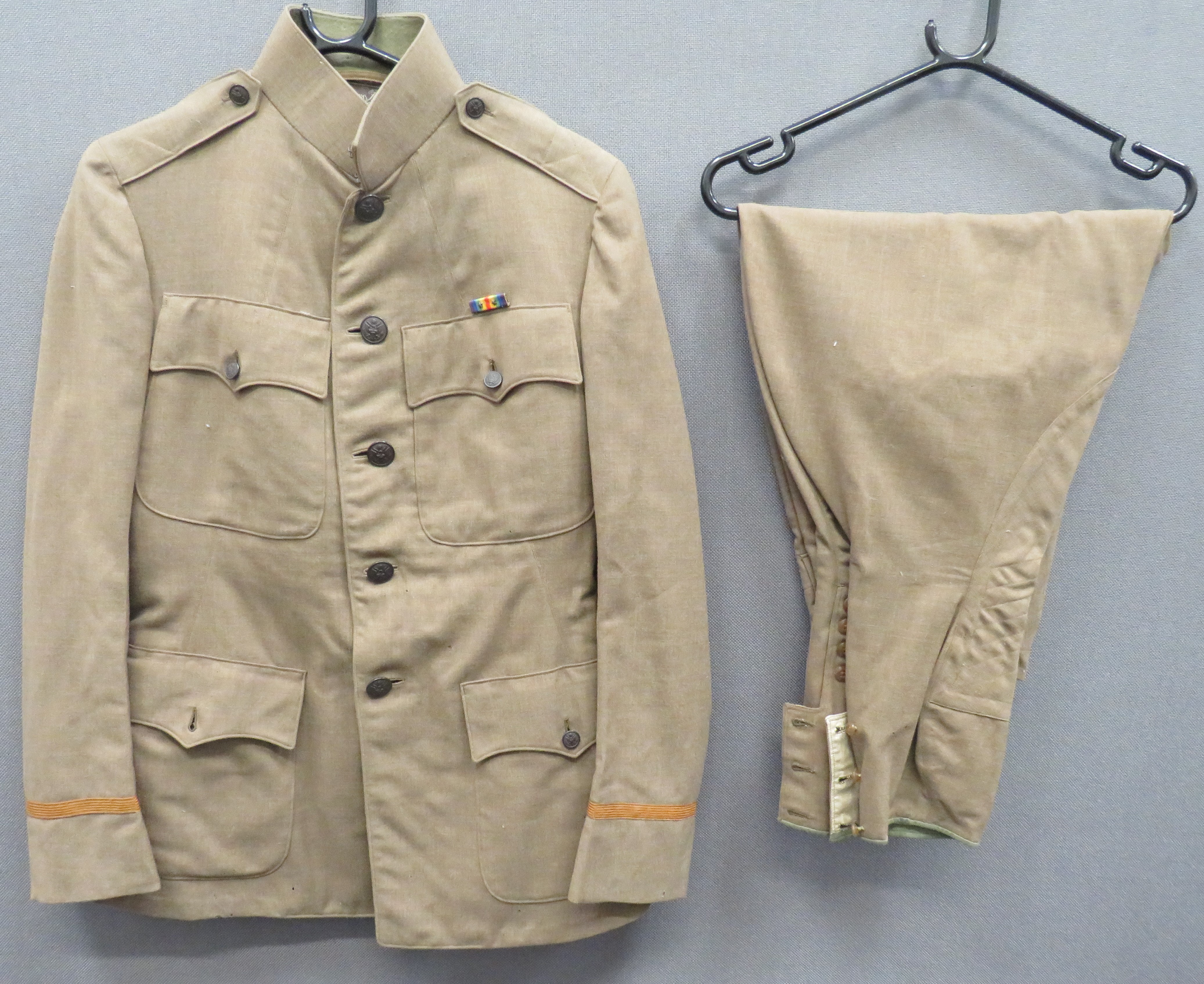 WW1 American Officer's Tunic and Breeches lightweight khaki, single breasted, high collar tunic.