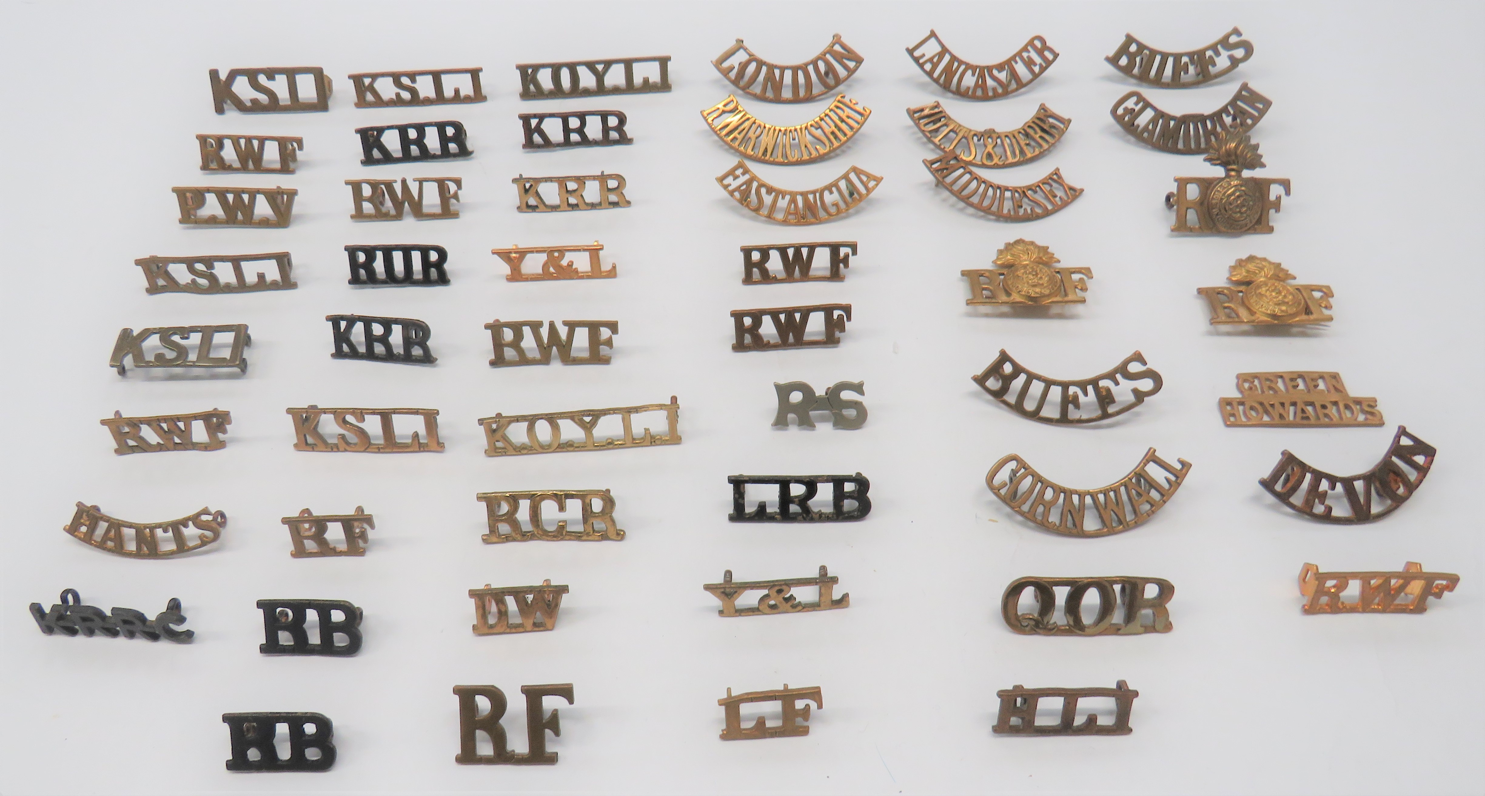 50 x Infantry Brass Shoulder Titles including KRR ... RWF ... Notts & Derby ... KSLI ... KOYLI ...
