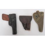 Three Various Holsters consisting canvas and leather, German small auto holster.  Base shortened.