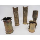 Five Various Trench Art Shell Cases consisting pair of German shells.  The body with embossed