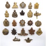 22 x Canadian Cap Badges including brass KC Royal Montreal Reg ... Brass Royal Canadian Dragoons ...