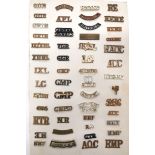 78 x Various Brass And Anodised Shoulder Titles brass include CMP ... CMP(1) ... NR ... RTR ...