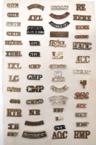 78 x Various Brass And Anodised Shoulder Titles brass include CMP ... CMP(1) ... NR ... RTR ...