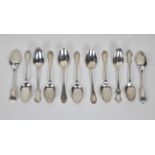 A set of eleven American silver shell back table spoons by Mermod Jaccard & King Co. of shaped