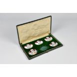 A cased set of 19th century Staffordshire enamel decanter labels each of escutcheon shape, to