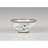 A fine quality Chinese eggshell porcelain bowl enamelled with cranes in flight amidst clouds,