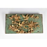 An antique Chinese green lacquered and carved giltwood plaque 18th / 19th century, depicting two