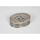 A Hanau silver snuff box of oval form, repoussé decorated to the hinged cover with a bear hunt,