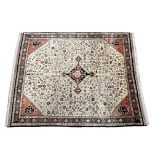 A large Persian Shiraz rug probably part-silk, from the Iranian province of Fars, woollen with