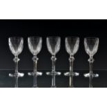 A set of twenty-one Waterford Curraghmore pattern port or sherry glasses 5 7/8in. (14.9cm.) high,