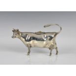 A Channel Islands silver cow creamer by Bruce Russell c.2001, of conventional form, with textured